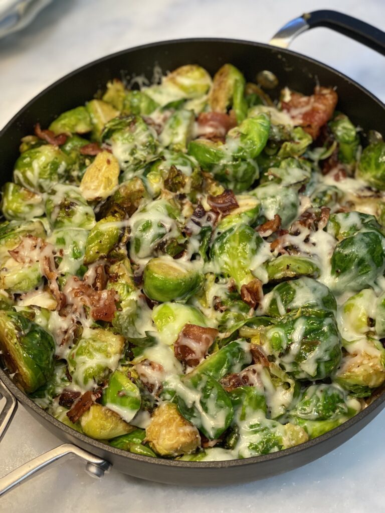 cheesy bacon brussels sprouts in pan