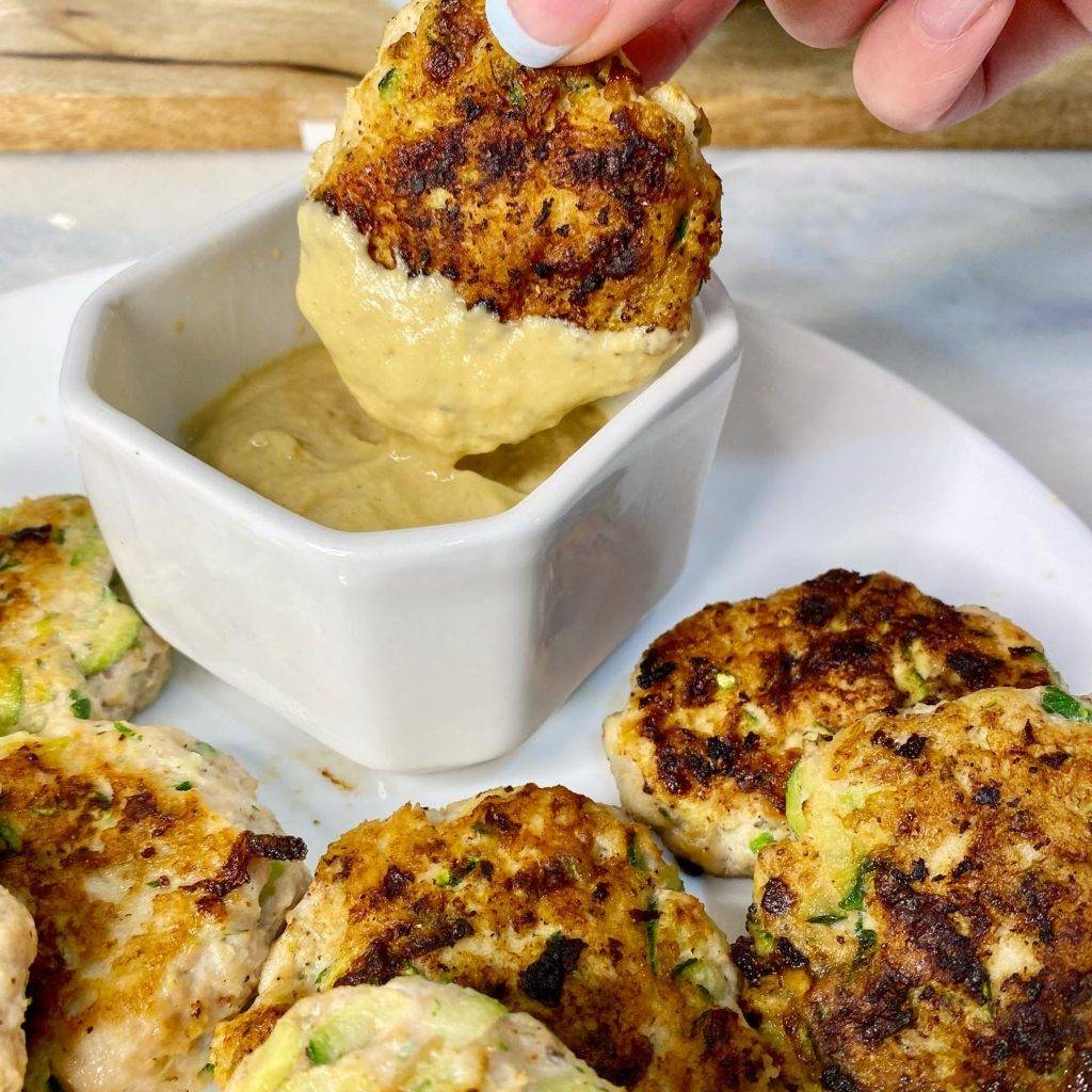 low carb chicken bites dipping in sauce