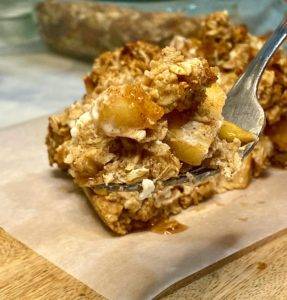 close up bite caramel apple cheesecake bars