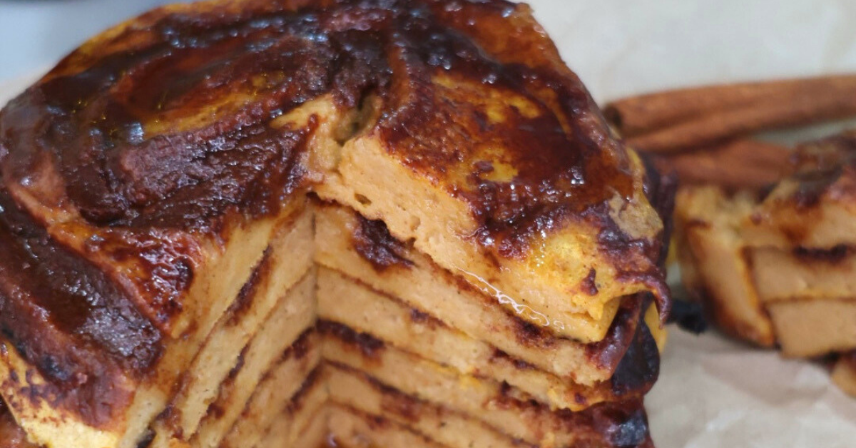 stack of fluffy pumpkin cinnamon roll Greek yogurt pancakes with cinnamon swirl