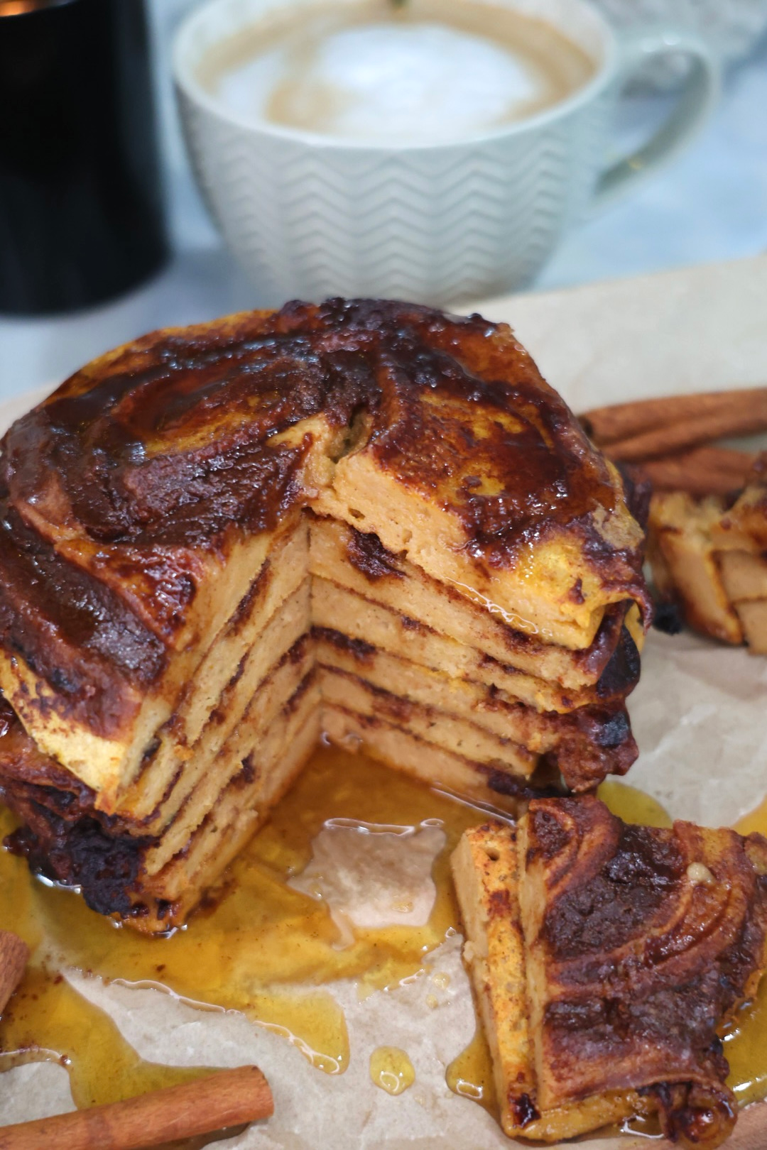 stack of fluffy pumpkin cinnamon roll Greek yogurt pancakes with cinnamon swirl