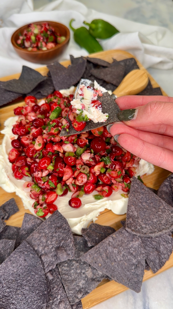The best cranberry salsa spread over creamy softened cheese.