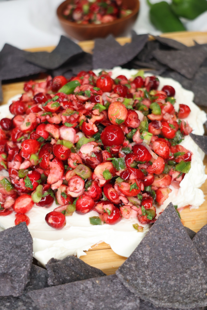 The best cranberry salsa spread over creamy softened cheese.