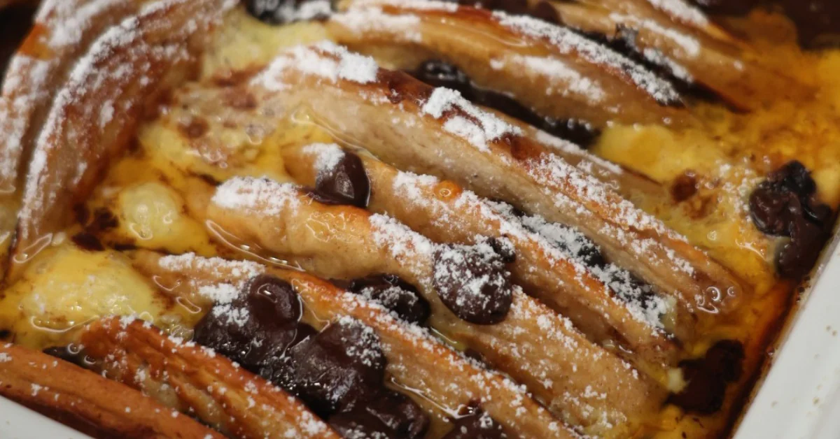 Sliced chocolate chip pancake casserole fresh from the oven