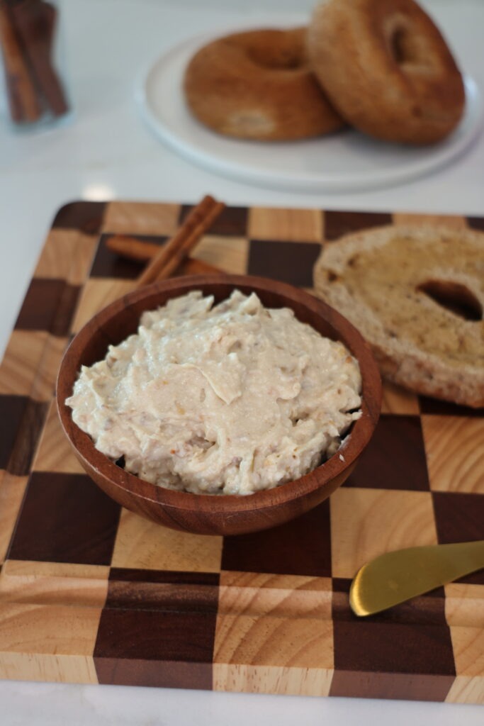 Thick honey walnut cream cheese spread over a toasted Eat Royo bagel